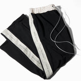 bootcut track pant / black + ivory bootcut track pant / black + ivory