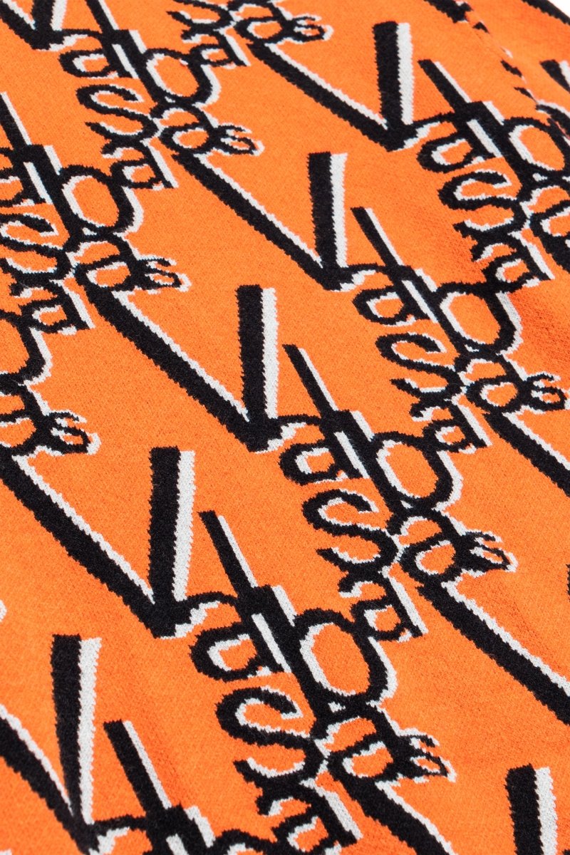 "ELYSIAN" TURTLE NECK TIGER TANGERINE "ELYSIAN" TURTLE NECK TIGER TANGERINE