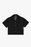 "TOUR" CROP BUTTON DOWN BLACK/YELLOW "TOUR" CROP BUTTON DOWN BLACK/YELLOW
