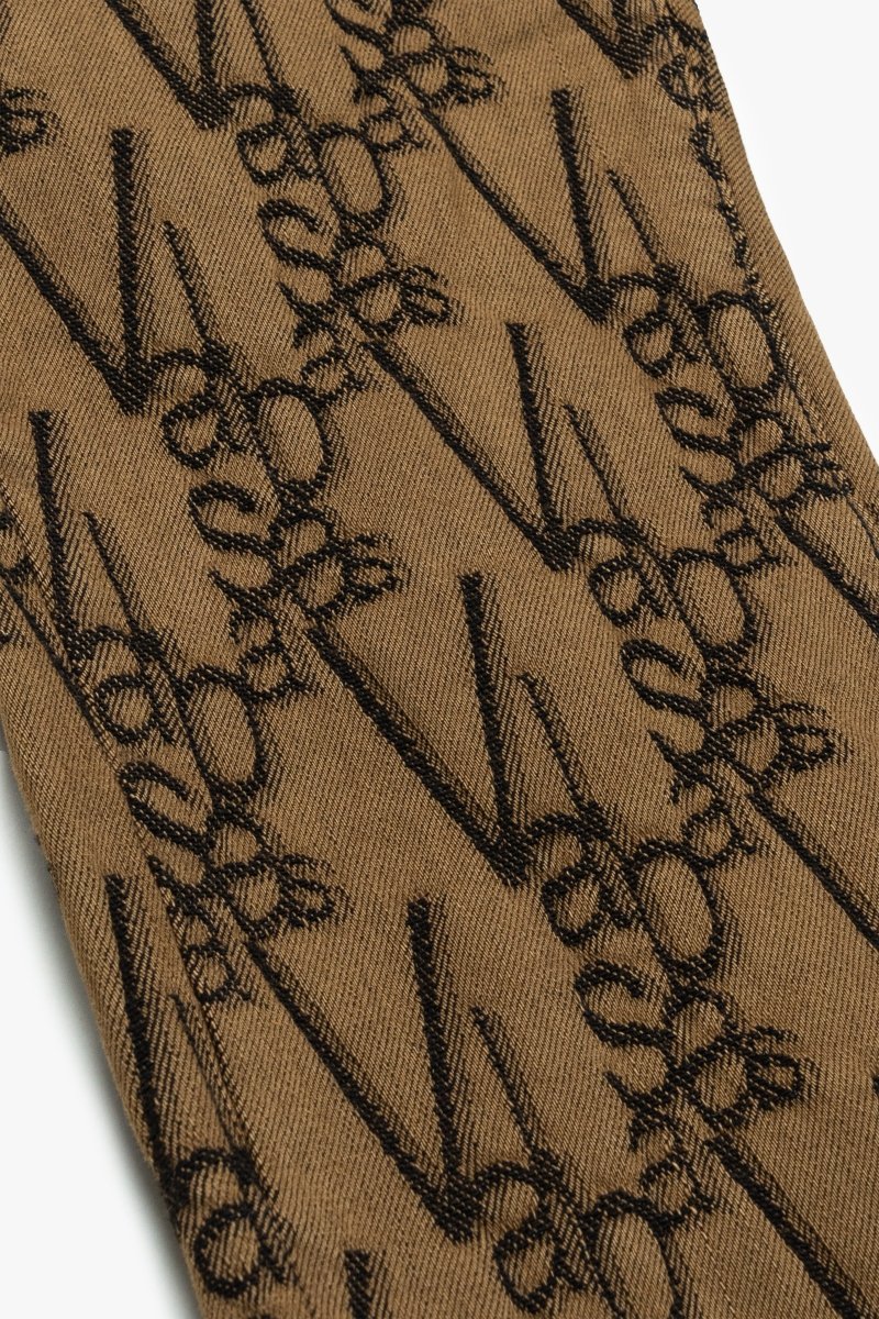 "V-SCRAWL" STACKED FLARE JEAN BLACK BROWN "V-SCRAWL" STACKED FLARE JEAN BLACK BROWN