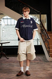 Layered Embroidered Crest Polo