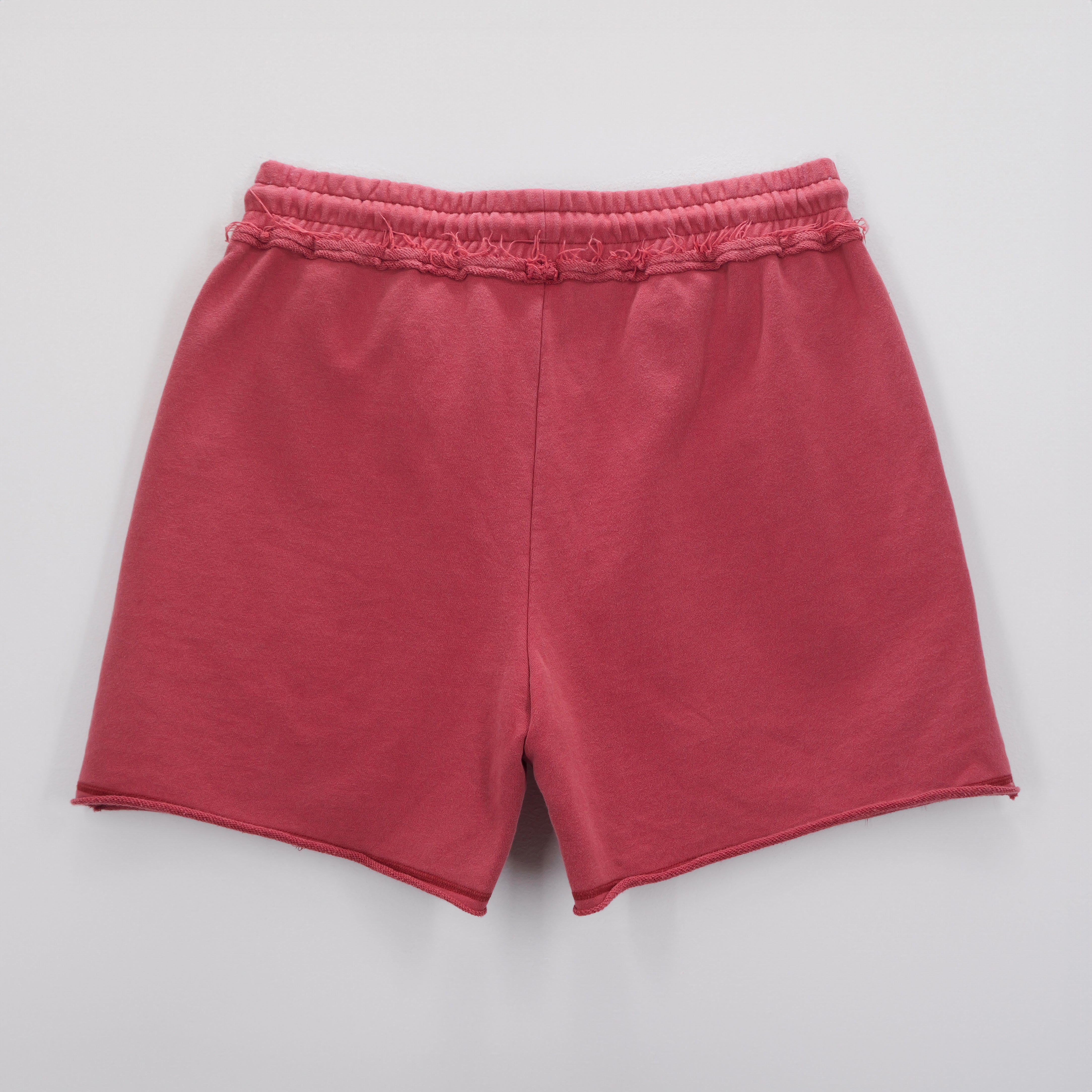 MADE WITH CARE CORE CARMINE SHORTS