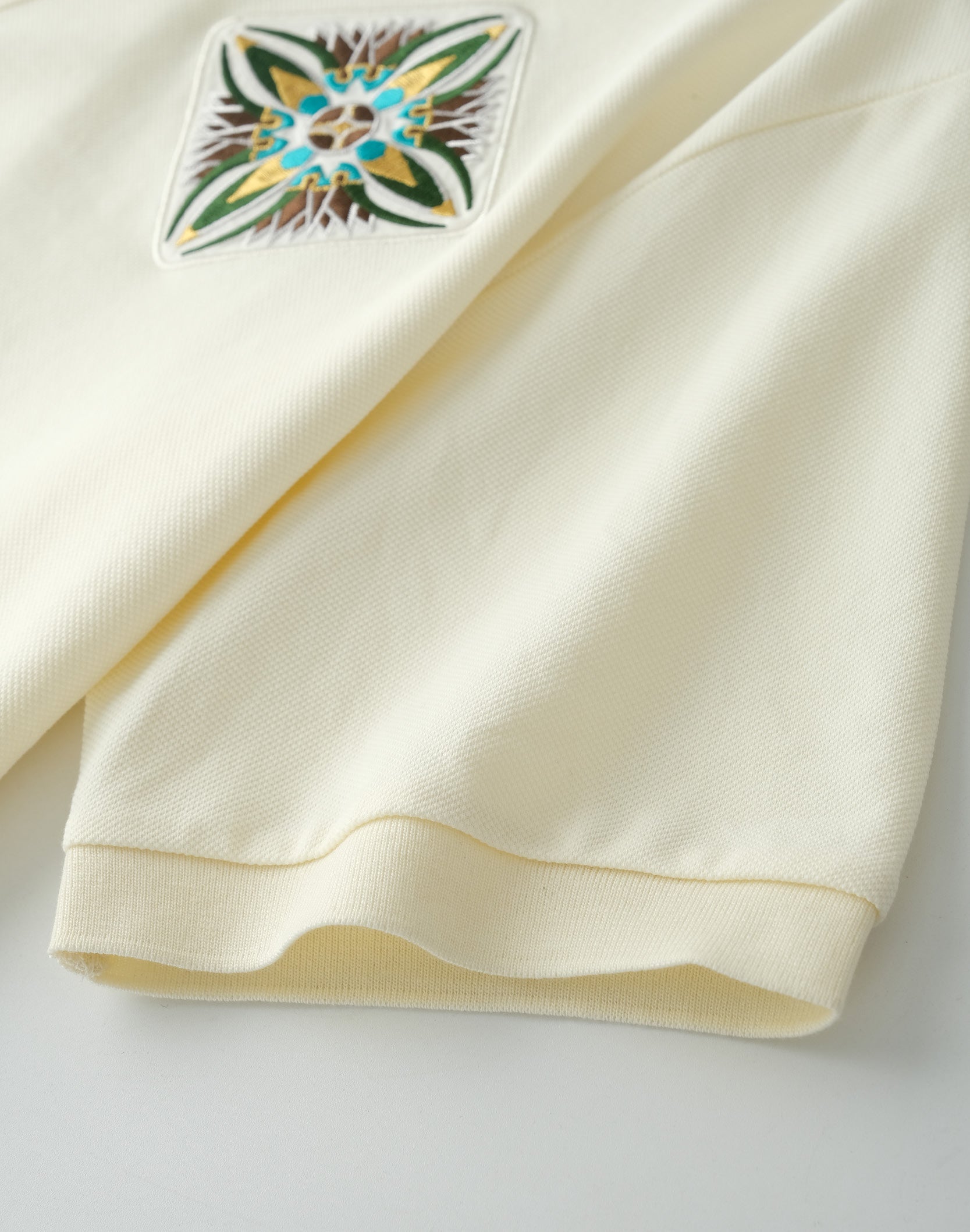 Fluid Placket Polo in WHT