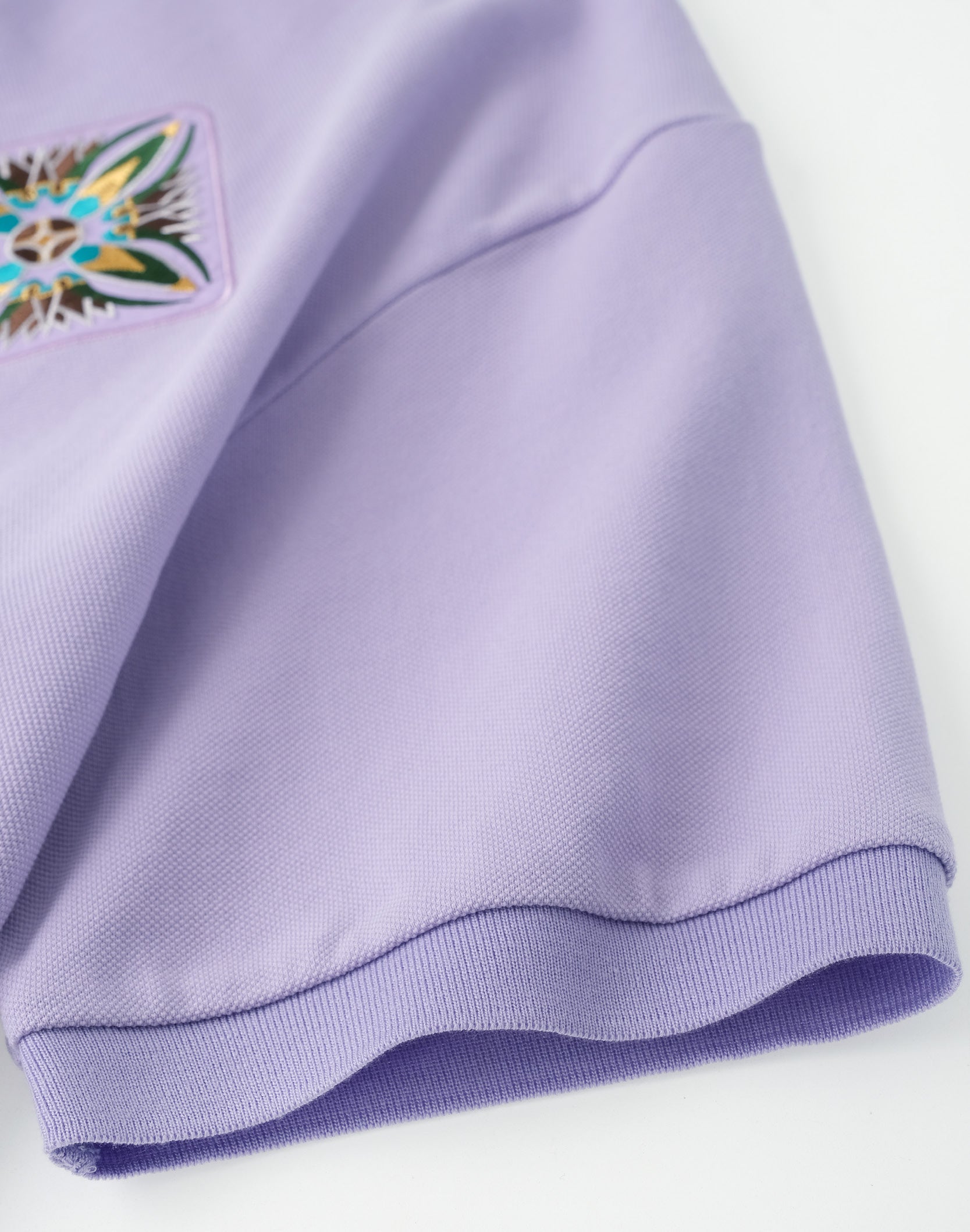 Fluid Placket Polo in PUR