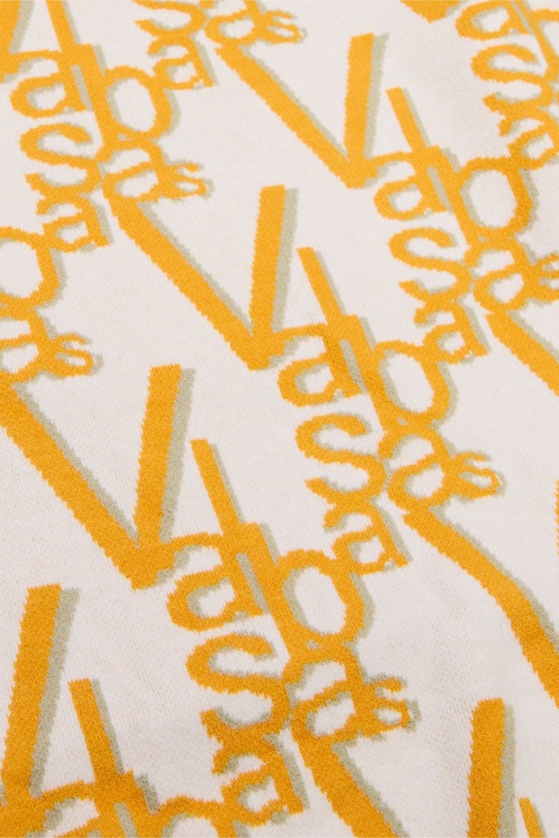 "ELYSIAN" TURTLE NECK CREAM CIRCLE