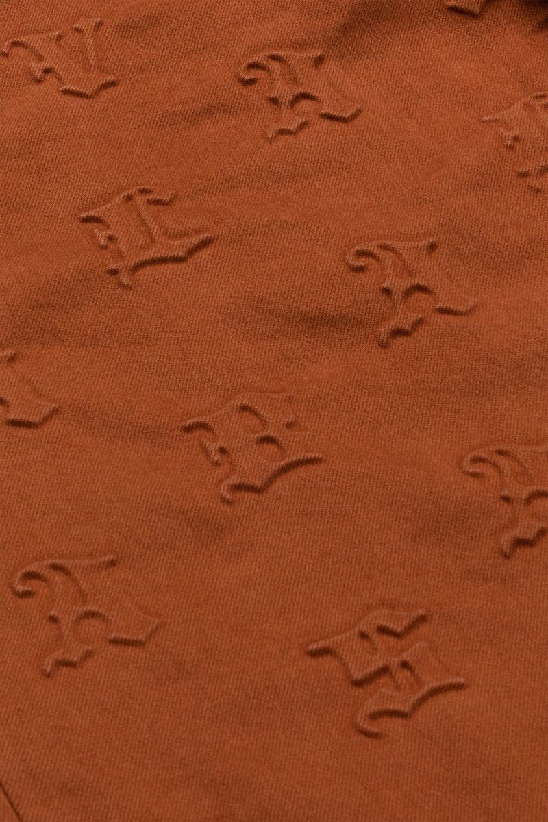 "FRITH”  STACKED FLARE JEAN TANGERINE