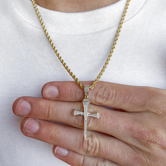 10k Solid Gold Diamond Nail Cross Pendant (.15 CTW)