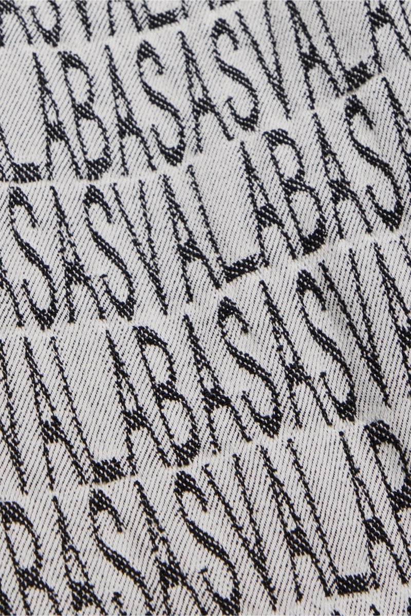 "IMPRINT” STACKED FLARE JEAN BLACK WHITE