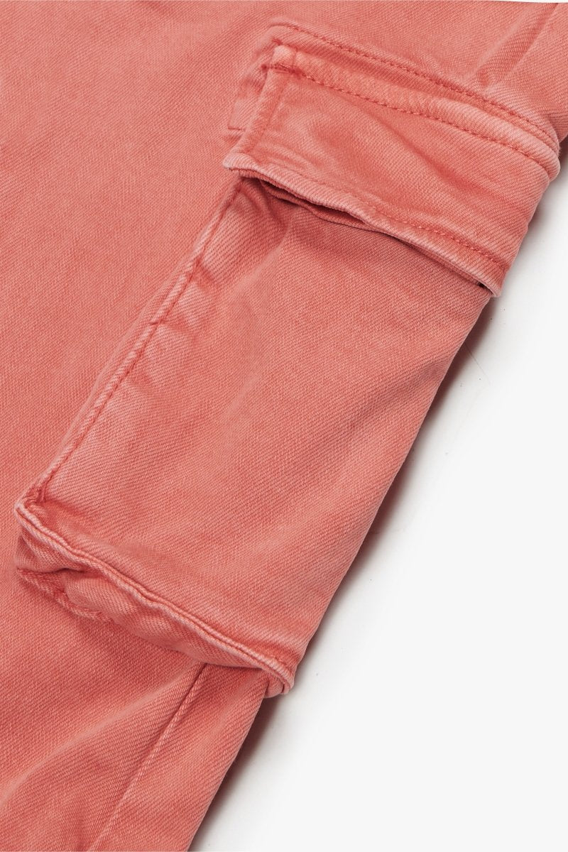 "PINNACLE” STACKED FLARE JEAN TANGERINE