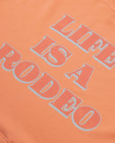 Rodeo "Life is a Rodeo" Crewneck Orange