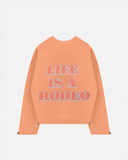 Rodeo "Life is a Rodeo" Crewneck Orange