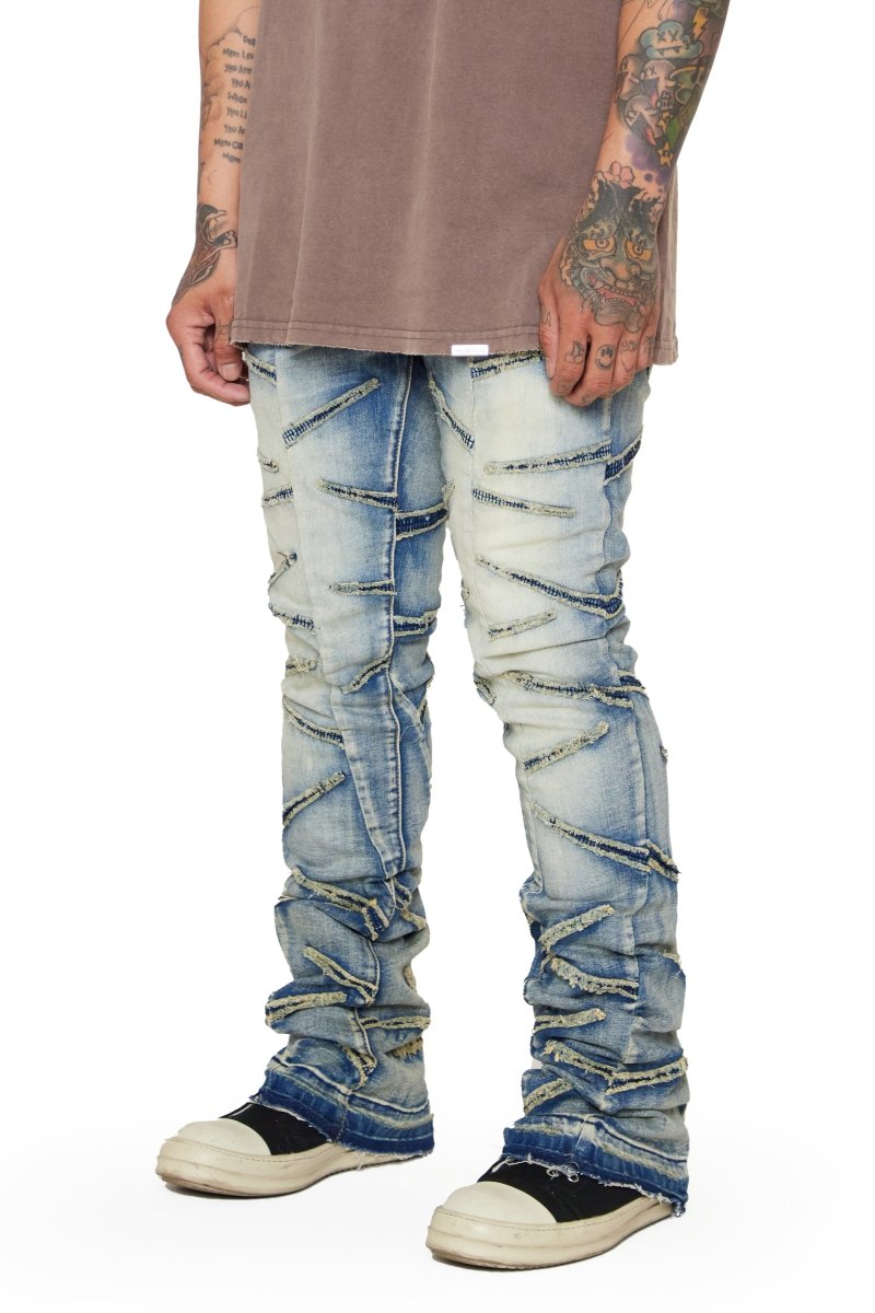 “SABER” STACKED FLARE JEAN LT BLUE