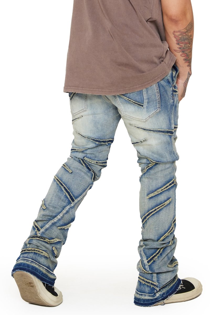 “SABER” STACKED FLARE JEAN LT BLUE