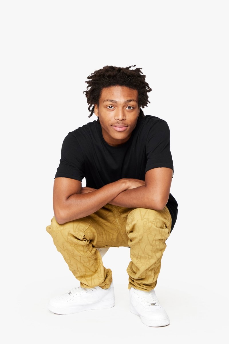 "V-SCRAWL" STACKED FLARE JEAN BLACK KHAKI